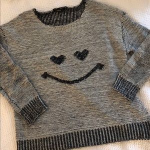 COZY AND CUTE HEART EYES SWEATER